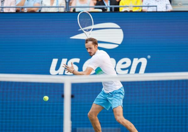 Daniil Medvedev [5] returns a volley against Nuno Borges (POR) during their match on Arthur Ashe Stadium at the 2024 US Open.